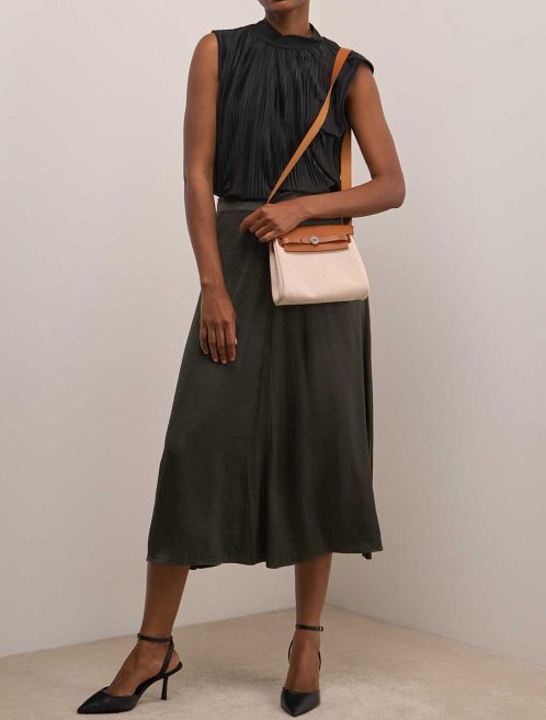 Hermès Herbag Mini Toile / Vache Hunter Écru / Beige / Fauve on Model | Sell your designer bag