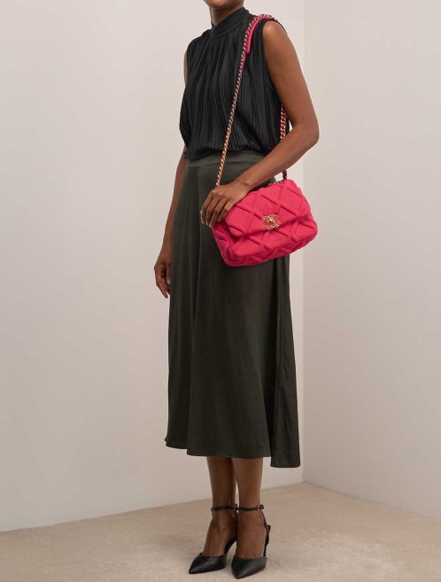 Chanel 19 Flap Bag Jersey / Lamb Pink on Model | Sell your designer bag