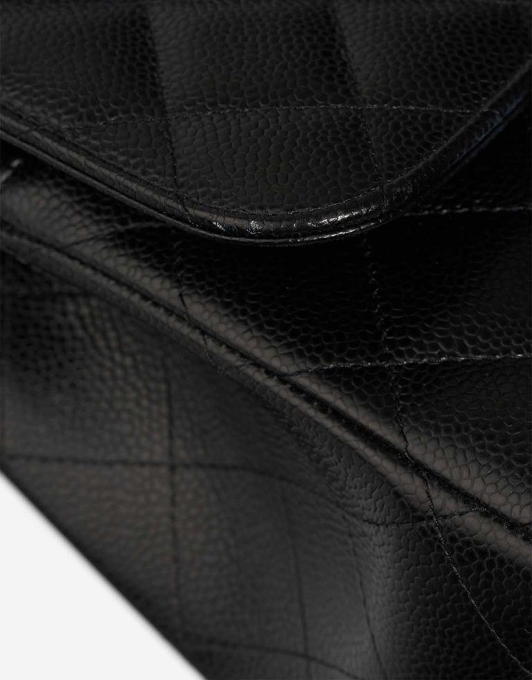 Chanel Timeless Jumbo Caviar Black Signs of wear | Sell your designer bag