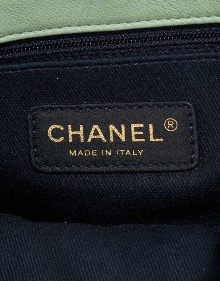 Chanel Flap Bag Chevron Medium Crinkled Calf Green Logo | Sell your designer bag