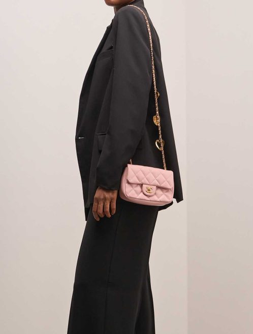 Chanel Timeless Mini Rectangular Lamb Light Pink on Model | Sell your designer bag