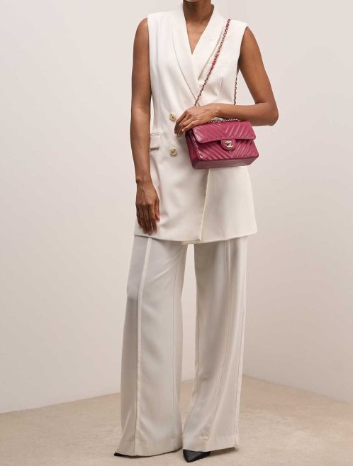 Chanel Timeless Chevron Small Lamb Pink on Model | Sell your designer bag