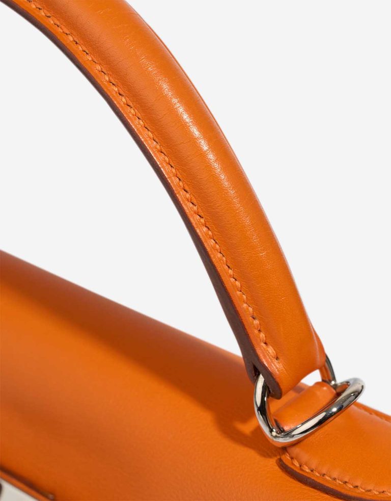 Hermès Kelly 32 Swift Feu Signs of wear | Sell your designer bag