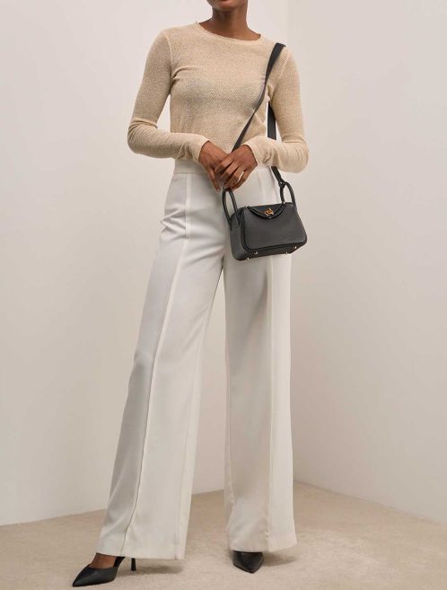 Hermès Lindy Mini Clémence Black on Model | Sell your designer bag