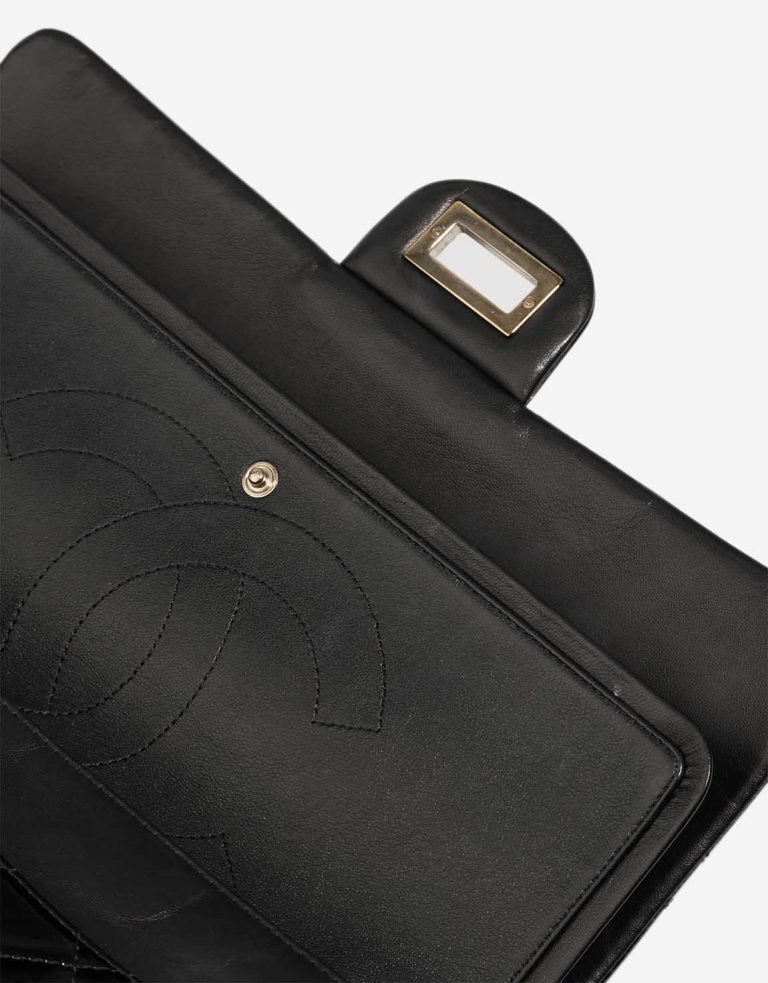 Chanel 2.55 Reissue 228 Patent Black Signs of wear | Sell your designer bag